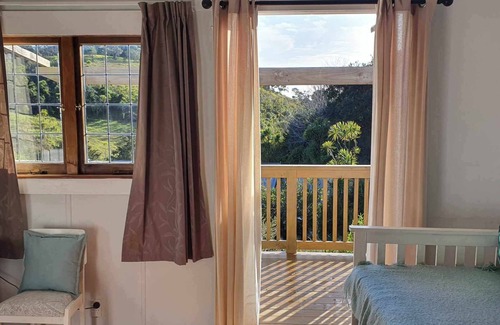 Tutukaka Cottage | Pebble cottage. Tutukaka Coast. Short walk to a nearby beach. Pet friendly.