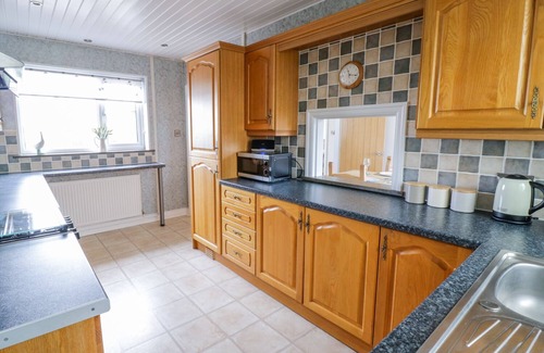 Brynteg House | PEN BRYN, with open fire in Benllech
