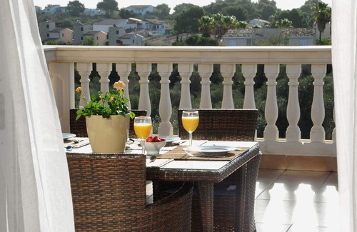 Cala Mandia Apartment | Penthouse apartment Vista Sol, large roof terrace with gardens and large pool