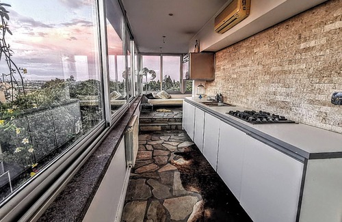 Tor di Quinto Apartment | Penthouse in picturesque Fleming where the sky merges with the beauty of Rome.
