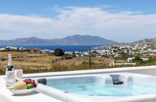 Paraga Apartment | Penthouse Suite with Breakfast at Regency Sunset Suites | Suite E (epsilon)