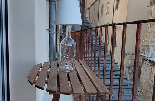 Caltagirone House | Penthouse with balcony overlooking the Caltagirone Steps