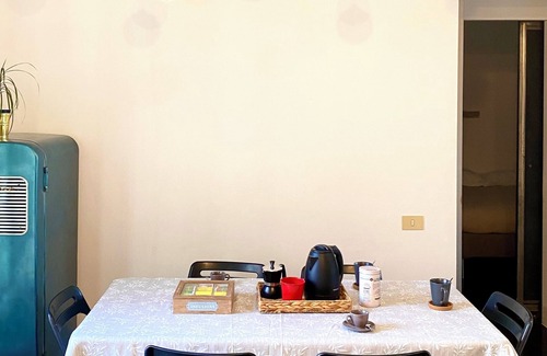 Monti Apartment | Penthouse with large terrace overlooking Colosseum and center of Rome.