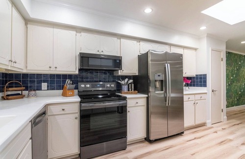 San Angelo House | Perfect blend of style and serenity in this 3-br, 2-bath bungalow guest house.