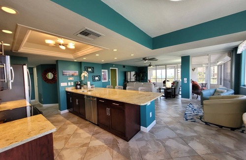 Vanderbilt Beach Condo | Perfect Location! On The Bay Direct View of Gulf! Wrap Around Lanai!