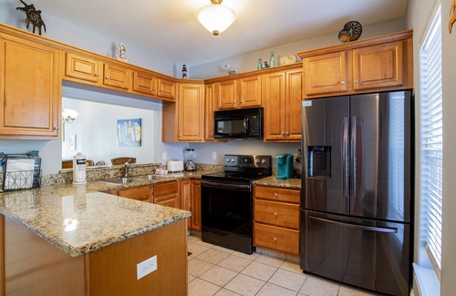 Sunset Pass Condo | Perfectly Positioned: Banana Bay Resort's Home Close to Everything You Need!