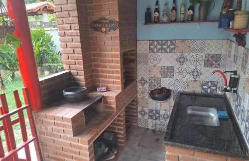 Lumiar House | Perto de tudo em Lumiar com churrasqueira, fogão a lenha e estacionamento
