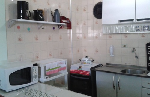 Centro Apartment | Peruíbe - Round Building Seasonal WIFI TV and Garage Ap 1207