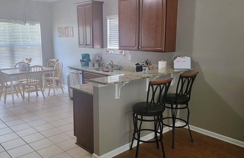 Little River House | Pet friendly 2 bed 2 bath home near golfing and walking distance to many places.