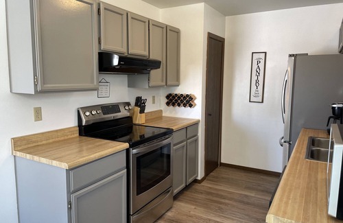Sheridan House | Pet Friendly 3 bedroom home near hospital, walking paths, Large fenced Backyard