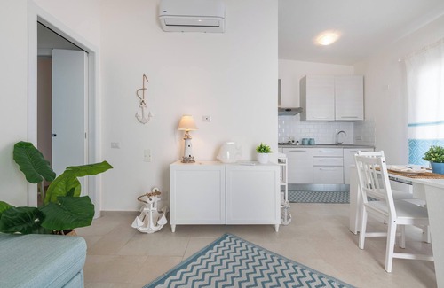Villasimius Apartment | Pet-Friendly Apartment 'La Casa dei Naviganti' with Courtyard, Jacuzzi & Wi-Fi