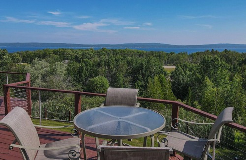 Petoskey House | Petoskey Home with Little Traverse Bay Views | Sleeps 8 | Wrap Around Deck
