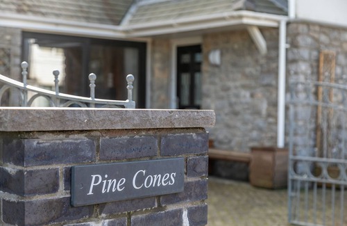 Rhoscolyn House | PINE CONES, with a garden in Four Mile Bridge