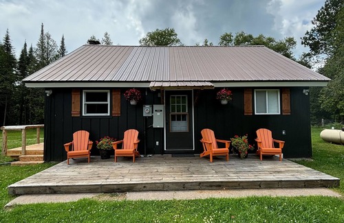 Hessel Cottage | Pine River Cottage -Savor the Summer by the River – A Waterfront Paradise!
