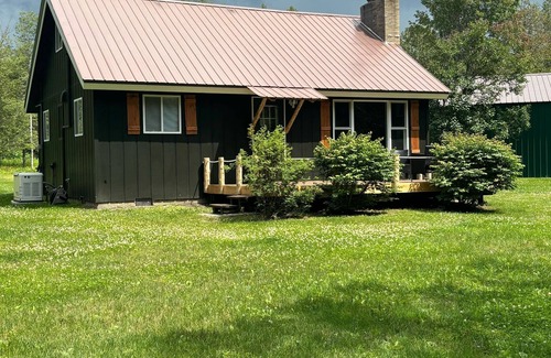 Hessel Cottage | Pine River Cottage -Savor the Summer by the River – A Waterfront Paradise!