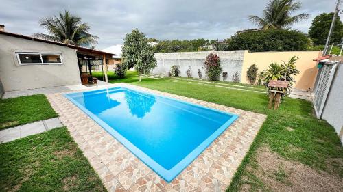 Manguinhos House | Piscina, Garagem, Praia e Conforto em Manguinhos