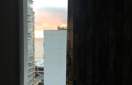 Pitangueiras Apartment | Pitangueiras Beach, near Shopping La Plage, 1 block from the beach