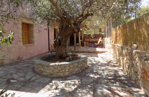 Plaka Cottage | Plakoura, a quiet cottage in village square of Plaka with a view to the sea.
