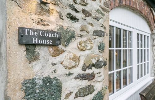 Bryngwran Cottage | Plas Coach House - a hot tub that sleeps 6 guests in 3 bedrooms