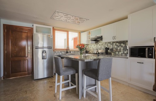 El Cortecito Condo | Playa Turquesa K403 200Mbps Private Beach Access Rooftop