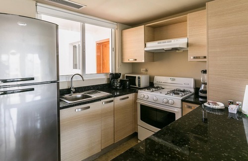 El Cortecito Condo | Playa Turquesa D303 80Mbps Private Beach Access BBQ Pools