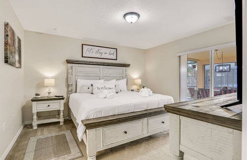 Lake Wilson Preserve House | Pleasant pool-view home with private pool, patio, streaming, enclosed lanai & AC