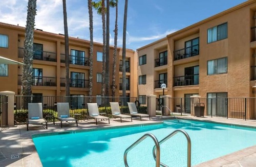 Downtown Village House | Pleasant Stay! TWO Comfortable Units with Balcony, Pet-friendly, Outdoor Pool!