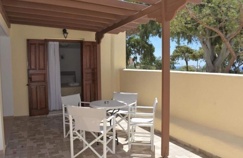 Kamari Apartment | Plethora Home: Quiet With Terrace in Traditional Kamari - bus Stop 3min Away