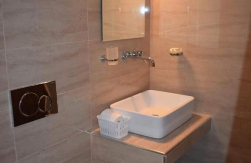 Kamari Apartment | Plethora Home: Quiet With Terrace in Traditional Kamari - bus Stop 3min Away