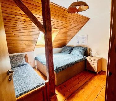 Pacejov Apartment | Podkroví v pošumavské chalupě
