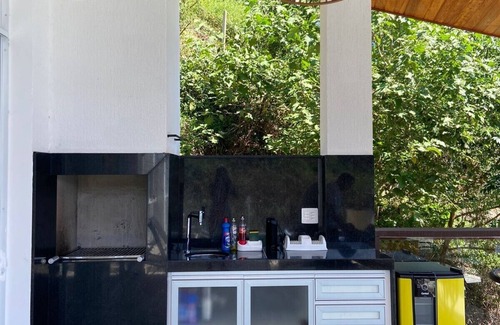 Biscaia House | Ponta Leste - Beautiful house on the coast of Angra in a closed condominium with beach.