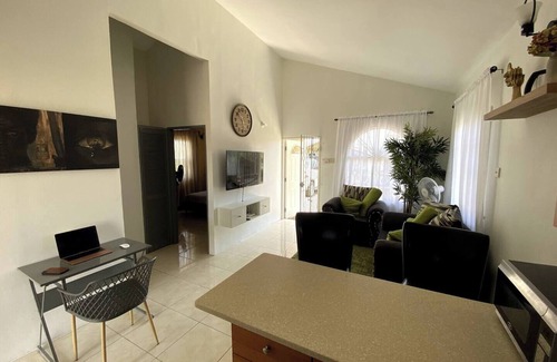 Caribbean Estates House | Portmore Haven: Secure Retreat with Beach Access