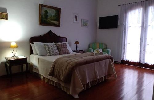 Quitandinha House | Pousada Canto da Paz