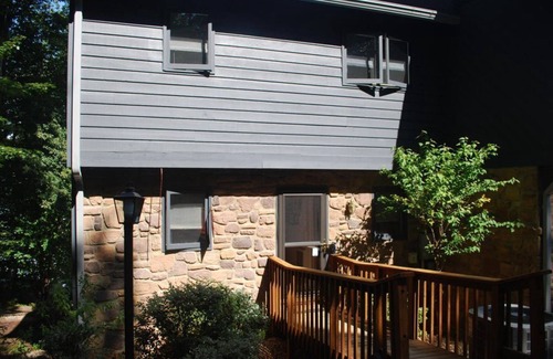 Huddleston House | Power down as hot tub, kayaks, and pool table await, water "footsteps away".