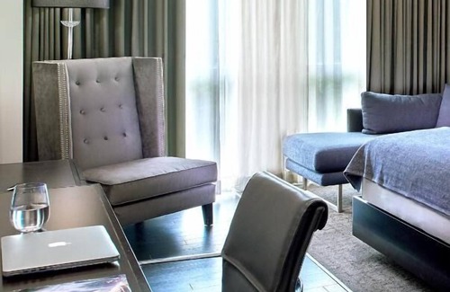 West Plaza Hotel | Premier Kansas City Luxury! Onsite Pool, Pets Allowed, Near Fountain of Neptune