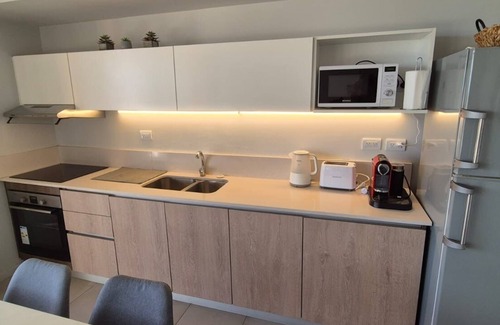 Pinamar Apartment | Premium apartment 2 minutes from the beach, heated swimming pool, spa, fitness center