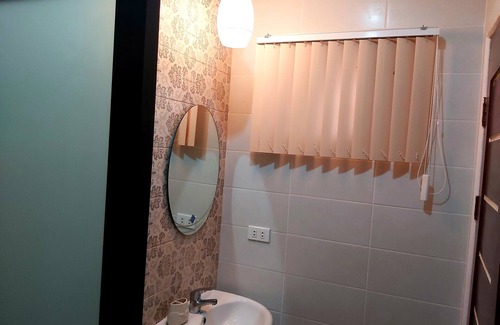 San Narciso House | Prestige Grounds Guesthouse with Lap Pool and Billiards