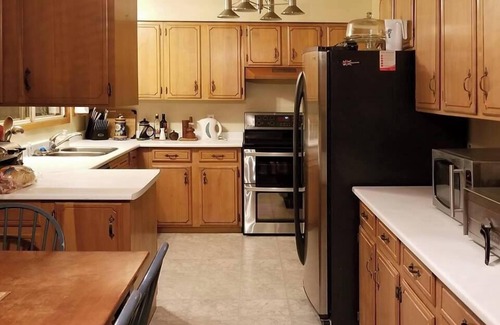 Kingston House | Prestigious residential family friendly home overlooking Golf Course!