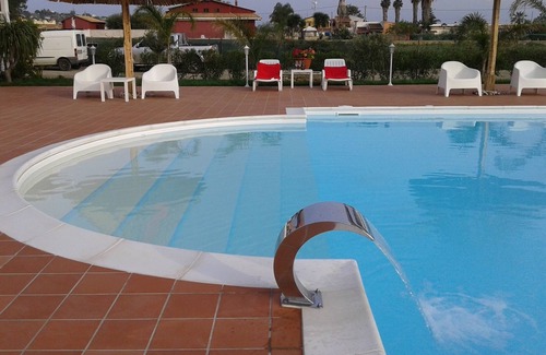 Fanusa Villa | prestigious villa with swimming pool surrounded by greenery near the sea