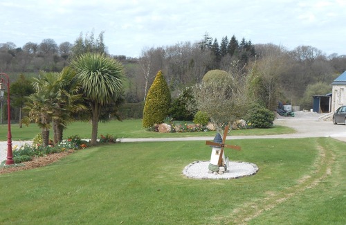 Brix House | Pretty stone house with large flowery grounds, open and green view