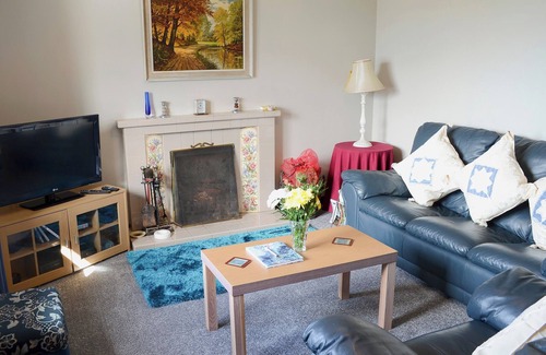 The Hebrides Cottage | Pretty whitewashed croft cottage perched on the hillside above the coastal village of Gairloch .