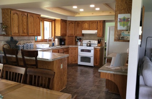 Big Arm House | Prime Lakefront home w/guest house - extra charge, dock, firepit, large yard