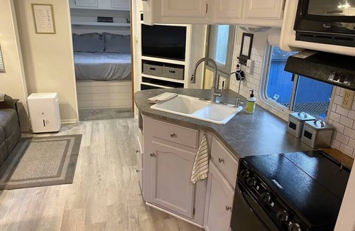 New London House | Private 2-bedroom camper at lakefront resort with wifi, pool, beach, mini golf