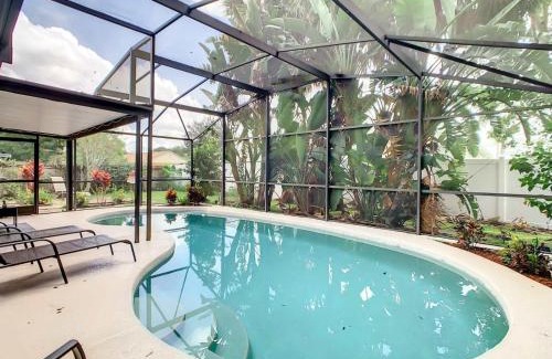 Poinciana House | Private 4BR villa with Screened in pool large yard