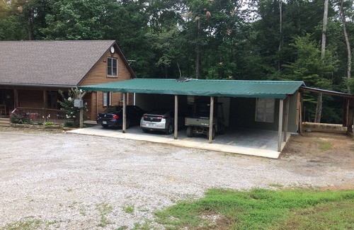 Sequatchie House | Private 50 ft waterfall. Eco-friendly, cozy shipping container cabin