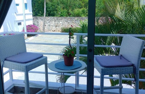 Juan Dolio - El Pueblo Apartment | Private Access to the Beach-Wifi-Pool-BBQ-Gozebos-Gardens