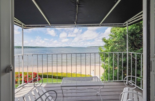 Boyne City Condo | Private Balcony Above Lake Charlevoix | Cozy Up & Unwind | Fireplace |