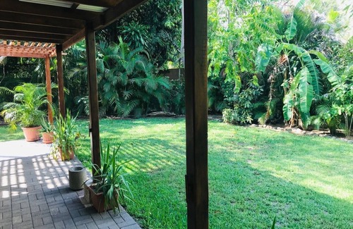 Palm Beach Estates Cottage | Private Beach studio private garden steps from the beach. Bike + Boogie bd incl