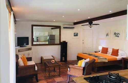 Palm Beach Estates Cottage | Private Beach studio private garden steps from the beach. Bike + Boogie bd incl