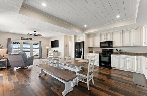 Bass Lake House | Private Dock, Bikes, Game Room, Paddle Boards, Kayaks, Yard Games & Fire Pit